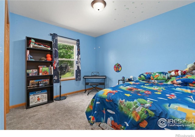 3816 Partridge Ct, Evans, CO 80620 - carpeted bedroom with baseboards