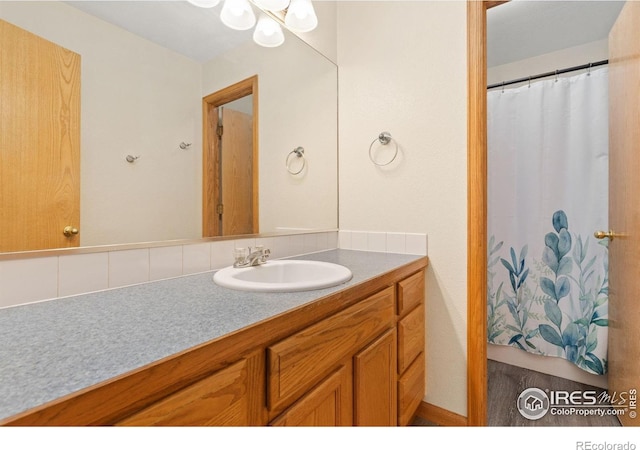 3816 Partridge Ct, Evans, CO 80620 - bathroom featuring vanity and curtained shower