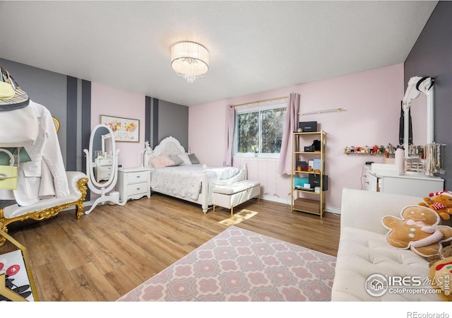 1892 Bell Dr, Erie, CO 80516 - bedroom with wood finished floors