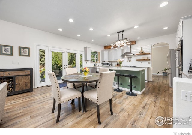 1892 Bell Dr, Erie, CO 80516 - dining area with recessed lighting, light wood-style flooring, and french doors