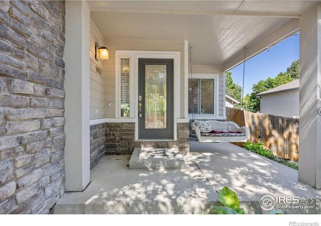1892 Bell Dr, Erie, CO 80516 - entrance to property featuring stone siding