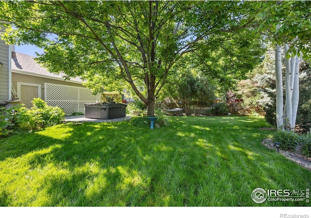 1892 Bell Dr, Erie, CO 80516 - view of yard with a hot tub
