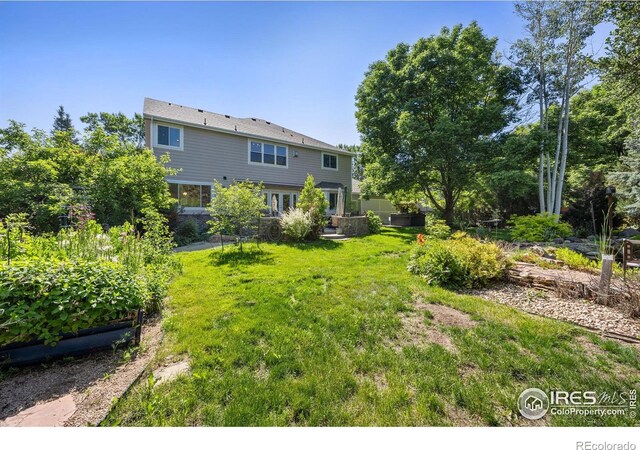 1892 Bell Dr, Erie, CO 80516 - view of green lawn