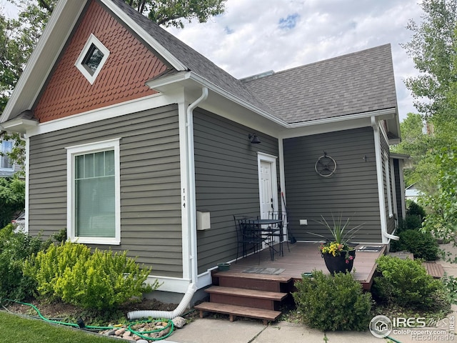 114 Park St, Sterling, CO 80751 - view of front of house with roof with shingles