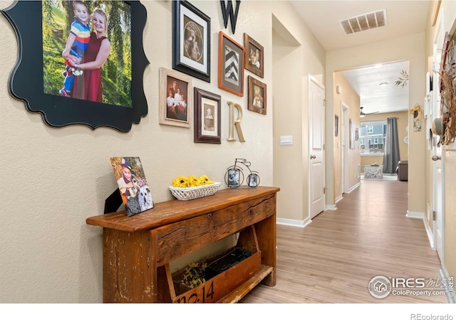 296 Swallow Rd, Johnstown, CO 80534 - corridor with wood finished floors and baseboards