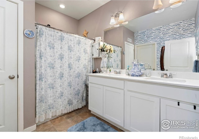 296 Swallow Rd, Johnstown, CO 80534 - full bath featuring double vanity and a shower with shower curtain
