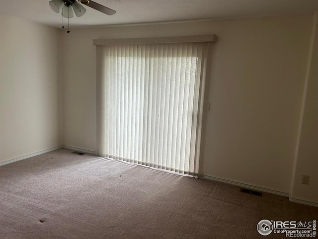 33180 Pikes Peak Dr, Greeley, CO 80631 - carpeted empty room with ceiling fan and baseboards
