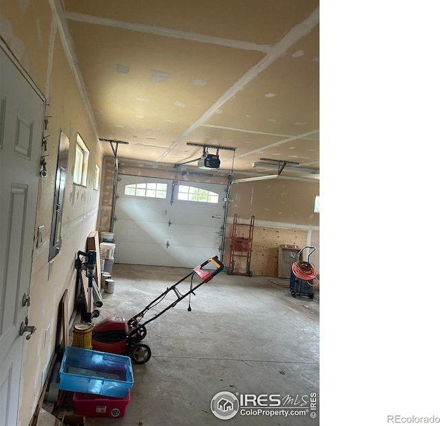 33180 Pikes Peak Dr, Greeley, CO 80631 - garage with a garage door opener