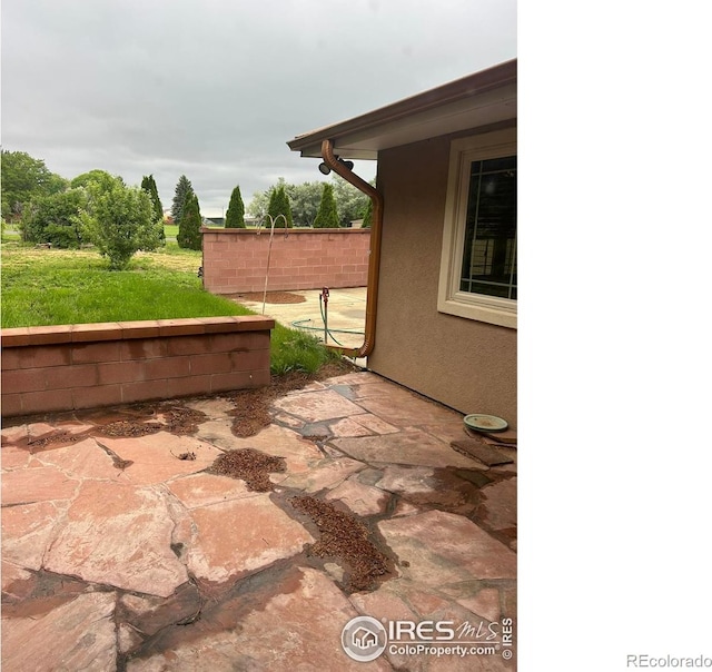 33180 Pikes Peak Dr, Greeley, CO 80631 - view of patio / terrace