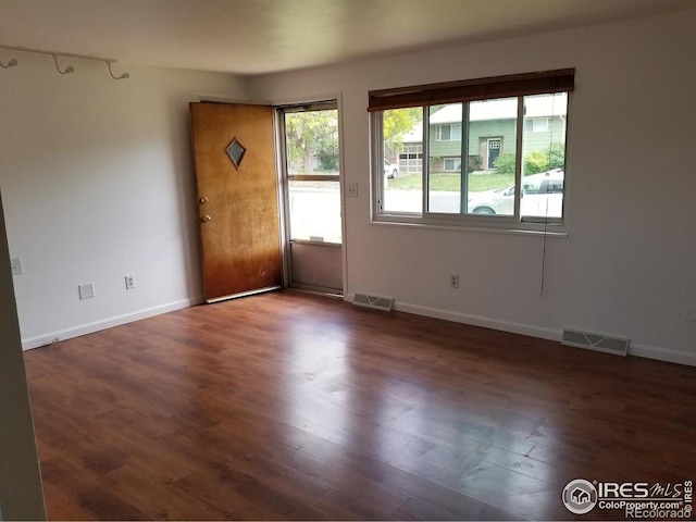 829 Hubbard Dr, Longmont, CO 80504 - unfurnished room featuring wood finished floors and baseboards