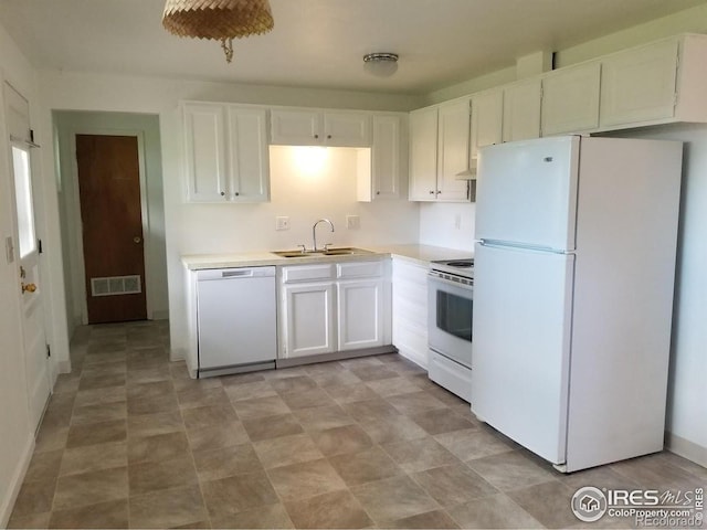 829 Hubbard Dr, Longmont, CO 80504 - kitchen with white appliances, a sink, white cabinets, and light countertops