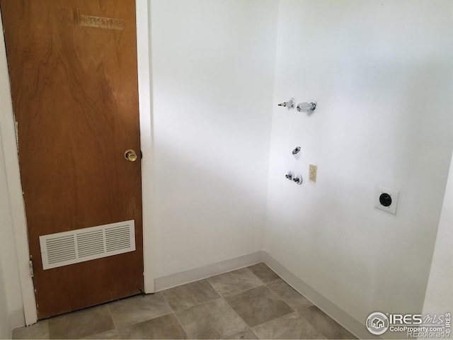 829 Hubbard Dr, Longmont, CO 80504 - washroom featuring washer hookup, hookup for an electric dryer, gas dryer hookup, and baseboards