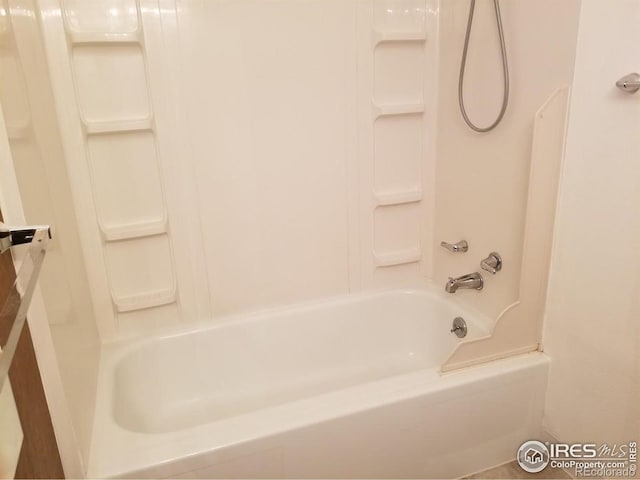 829 Hubbard Dr, Longmont, CO 80504 - bathroom featuring tub / shower combination