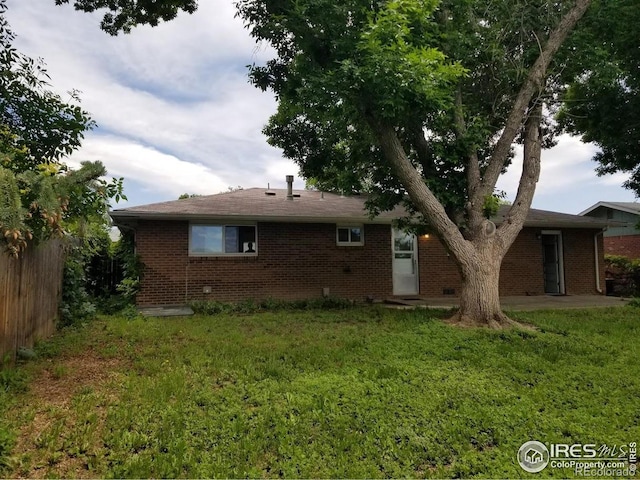 829 Hubbard Dr, Longmont, CO 80504 - back of property featuring brick siding