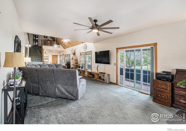 39445 Main St, Eaton, CO 80615 - living area featuring a ceiling fan, healthy amount of natural light, vaulted ceiling, and carpet floors