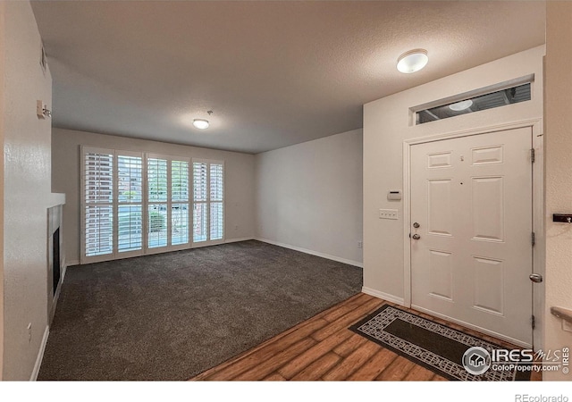 804 Summer Hawk Dr Unit 105, Longmont, CO 80504 - foyer with wood finished floors and baseboards