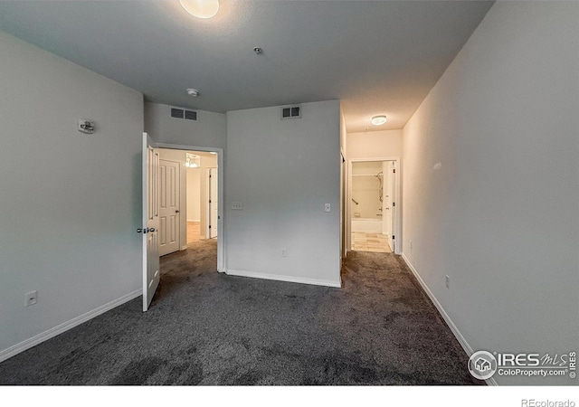 804 Summer Hawk Dr Unit 105, Longmont, CO 80504 - unfurnished bedroom with carpet flooring and baseboards
