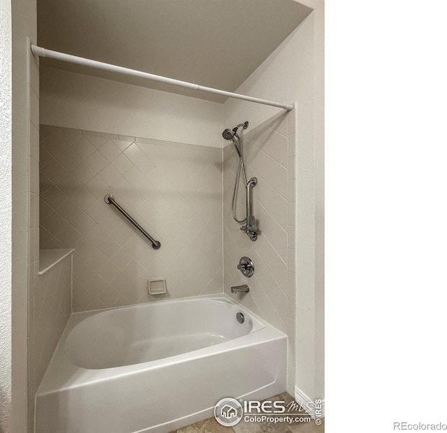 804 Summer Hawk Dr Unit 105, Longmont, CO 80504 - bathroom featuring bathing tub / shower combination