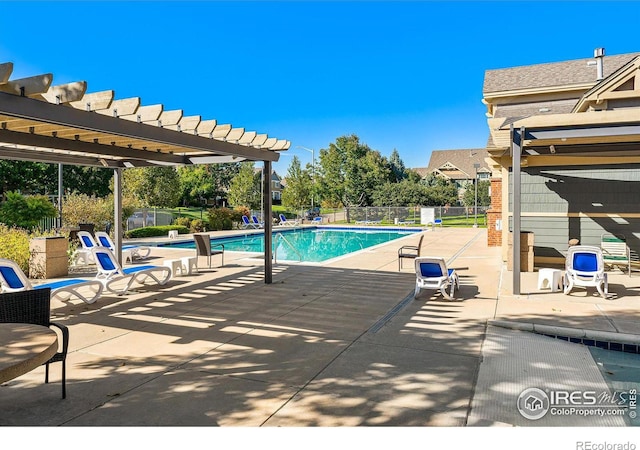804 Summer Hawk Dr Unit 105, Longmont, CO 80504 - community pool featuring a pergola and a patio area