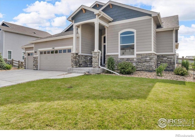 1368 Waterfall St, Timnath, CO 80547 - craftsman inspired home featuring an attached garage, a front yard, concrete driveway, and stone siding