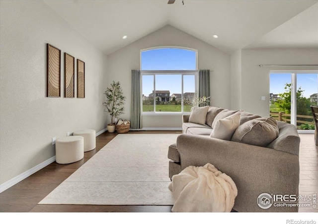 1368 Waterfall St, Timnath, CO 80547 - living room with healthy amount of natural light, wood finished floors, lofted ceiling, ceiling fan, and recessed lighting