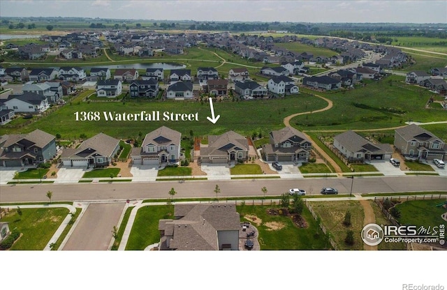 1368 Waterfall St, Timnath, CO 80547 - aerial perspective of suburban area featuring a nearby body of water