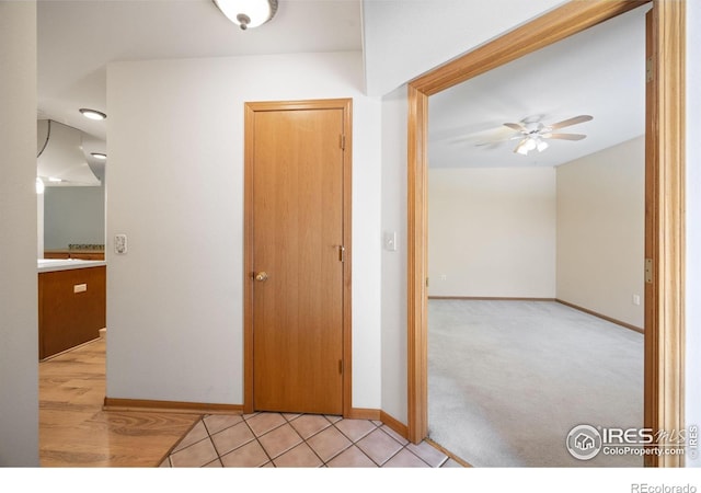 3641 Wild Horse Ct, Loveland, CO 80538 - foyer with ceiling fan and baseboards