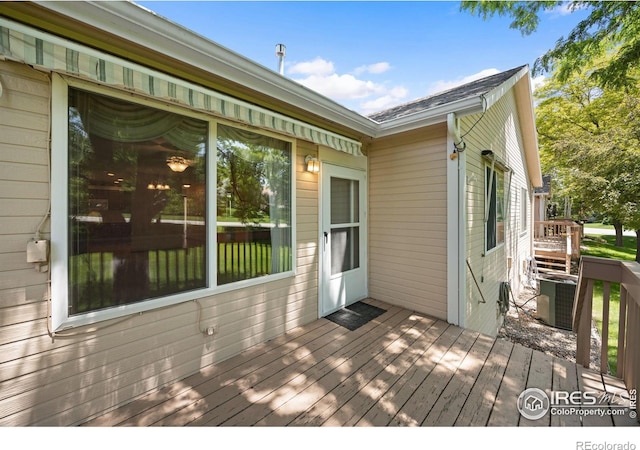 3641 Wild Horse Ct, Loveland, CO 80538 - wooden deck with central air condition unit