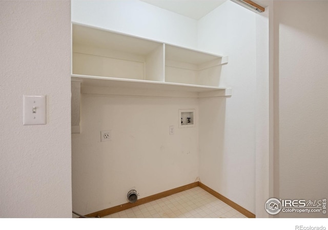 3641 Wild Horse Ct, Loveland, CO 80538 - laundry area with electric dryer hookup, light flooring, hookup for a washing machine, and baseboards