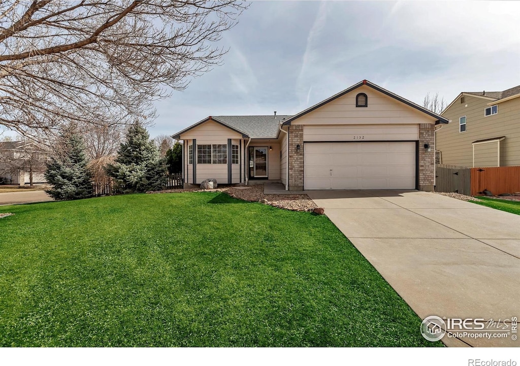 2132 Boise Ct, Longmont, CO 80504 - ranch-style home featuring an attached garage, concrete driveway, and brick siding