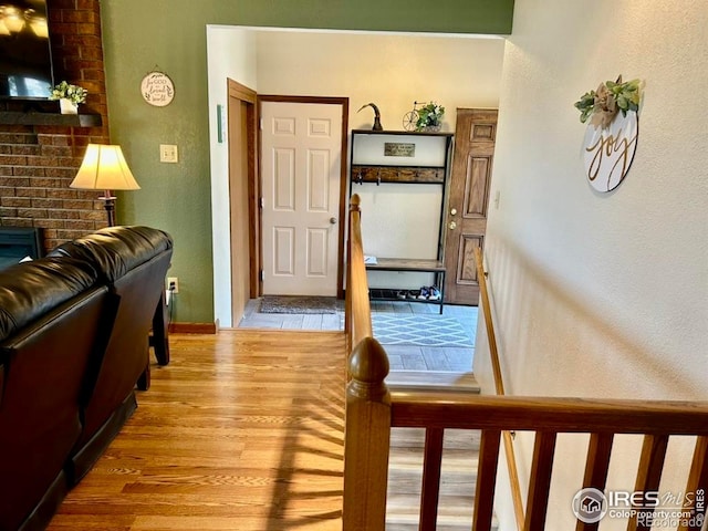 1722 Pheasant Rdg, Sterling, CO 80751 - foyer featuring wood finished floors and a textured wall