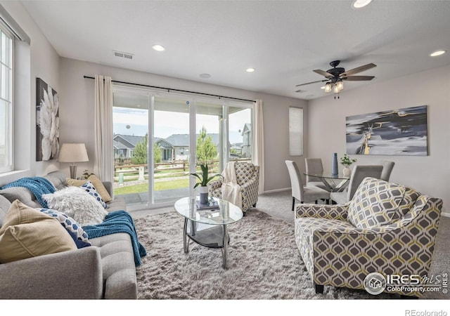 17871 E 96th Pl, Commerce City, CO 80022 - carpeted living room featuring recessed lighting, ceiling fan, and baseboards