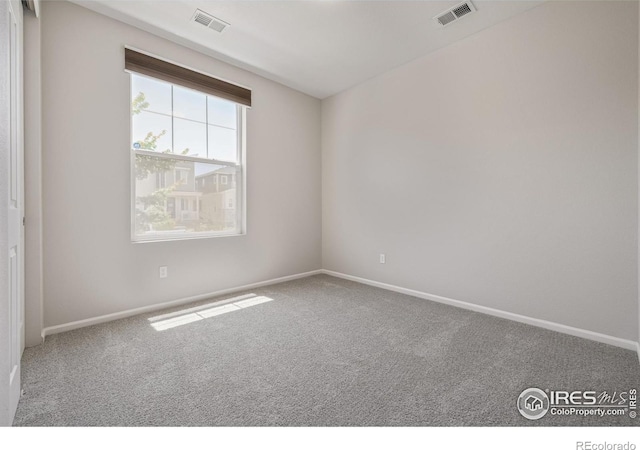 17871 E 96th Pl, Commerce City, CO 80022 - carpeted spare room featuring baseboards