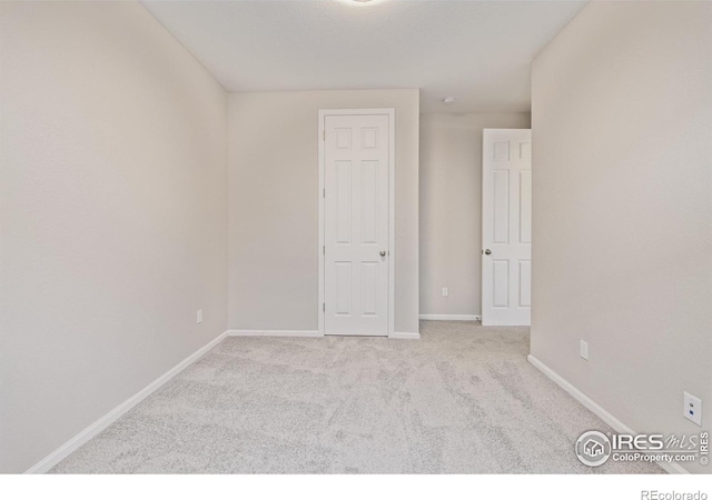 17871 E 96th Pl, Commerce City, CO 80022 - carpeted empty room featuring baseboards