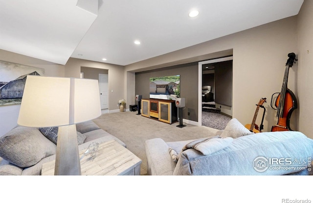 6945 N Fargo Trl, Littleton, CO 80125 - carpeted living area with baseboards and recessed lighting