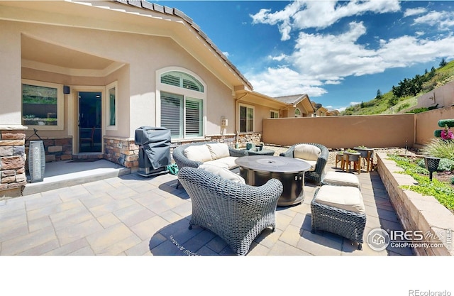6945 N Fargo Trl, Littleton, CO 80125 - view of patio featuring area for grilling and an outdoor hangout area
