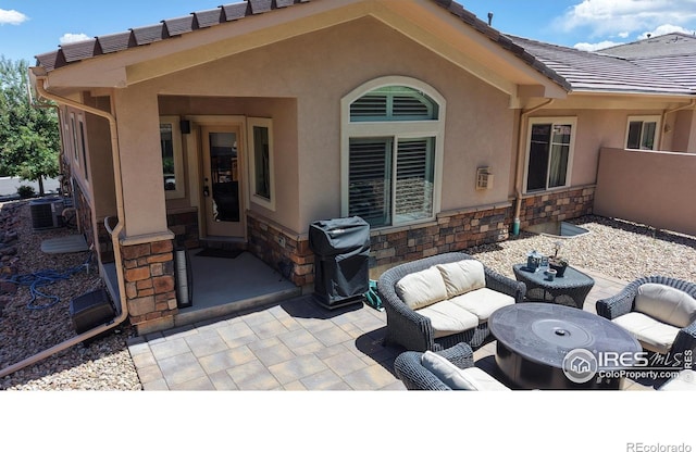 6945 N Fargo Trl, Littleton, CO 80125 - view of patio / terrace featuring outdoor lounge area