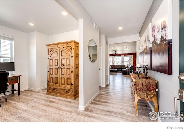 1191 Horsetail Loop, Elizabeth, CO 80107 - hallway featuring a desk, light wood finished floors, recessed lighting, and baseboards