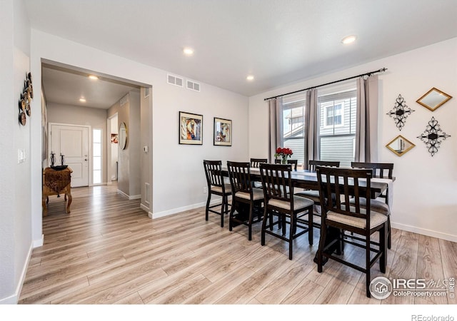 1191 Horsetail Loop, Elizabeth, CO 80107 - dining area featuring light wood-style floors, baseboards, and recessed lighting