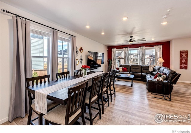 1191 Horsetail Loop, Elizabeth, CO 80107 - dining space featuring healthy amount of natural light, recessed lighting, light wood finished floors, a ceiling fan, and baseboards