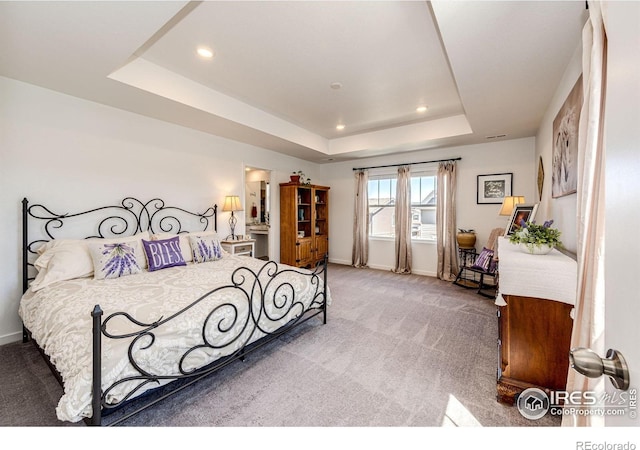 1191 Horsetail Loop, Elizabeth, CO 80107 - carpeted bedroom featuring a raised ceiling, baseboards, and recessed lighting