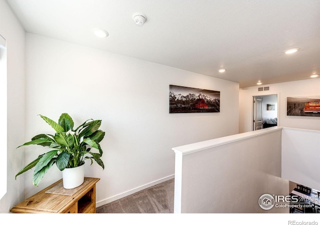 1191 Horsetail Loop, Elizabeth, CO 80107 - hall with an upstairs landing, carpet flooring, recessed lighting, and baseboards