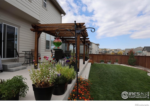 1191 Horsetail Loop, Elizabeth, CO 80107 - view of yard featuring a pergola, a patio, and a residential view