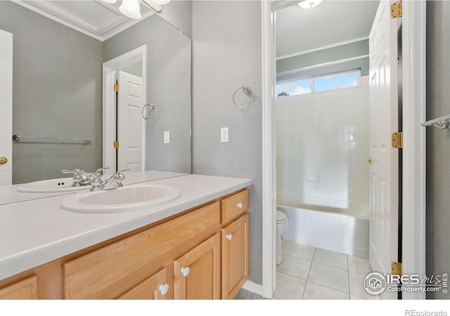 10216 Sandy Ridge Ct, Firestone, CO 80504 - full bath featuring ornamental molding, toilet, vanity, tile patterned flooring, and bathtub / shower combination