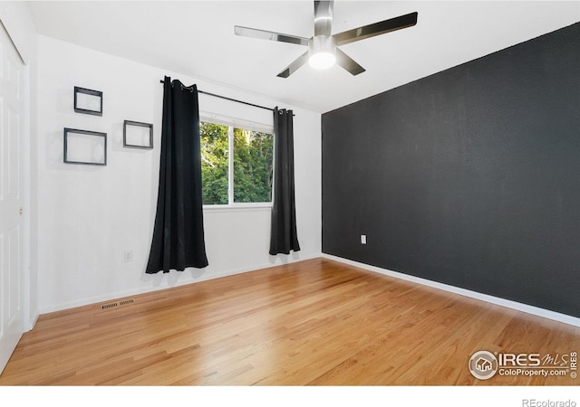 10216 Sandy Ridge Ct, Firestone, CO 80504 - empty room featuring wood finished floors, a ceiling fan, and baseboards