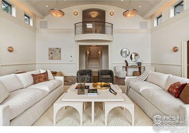 45 Bellevue Dr, Boulder, CO 80302 - living area featuring a high ceiling, stairway, and ornamental molding