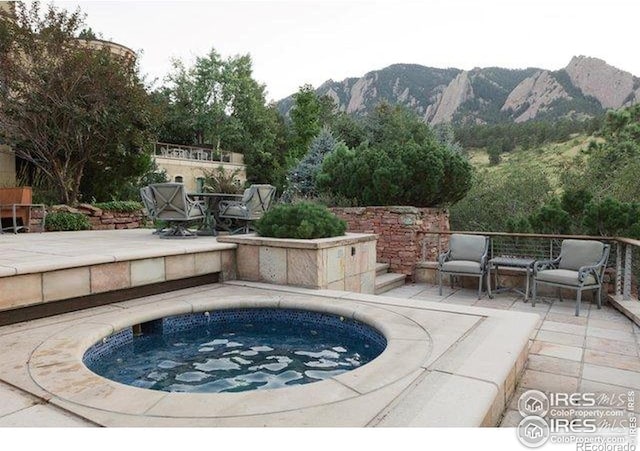 45 Bellevue Dr, Boulder, CO 80302 - view of pool featuring a jacuzzi, a mountain view, and a patio area