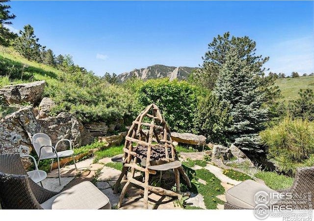 45 Bellevue Dr, Boulder, CO 80302 - view of patio with a mountain view