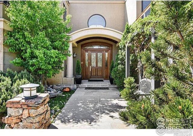 45 Bellevue Dr, Boulder, CO 80302 - property entrance with stucco siding and french doors