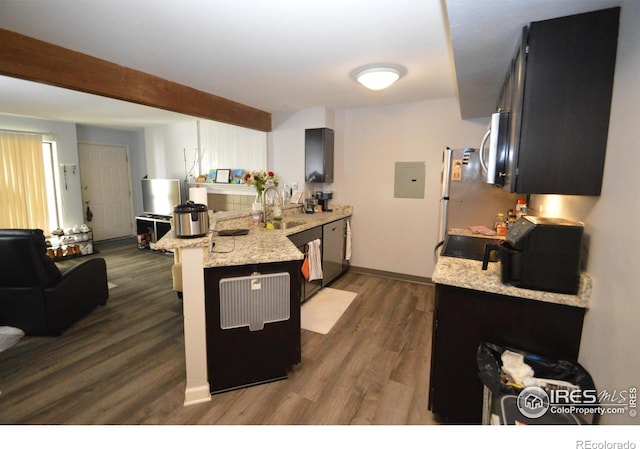 20 S Boulder Cir Unit 2204, Boulder, CO 80303 - kitchen featuring a peninsula, appliances with stainless steel finishes, a sink, dark wood-type flooring, and electric panel